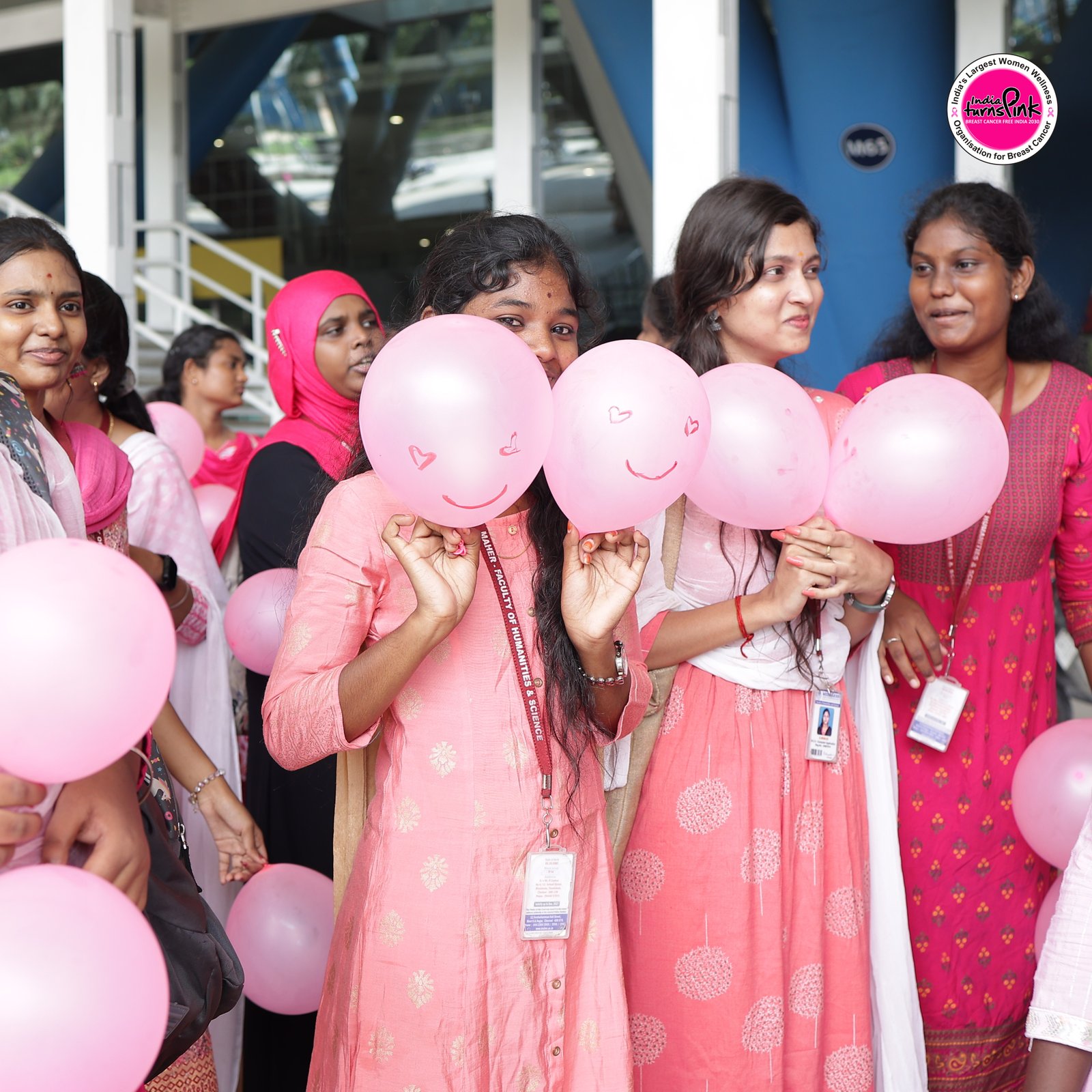 Volunteers and community members at an awareness outreach activity