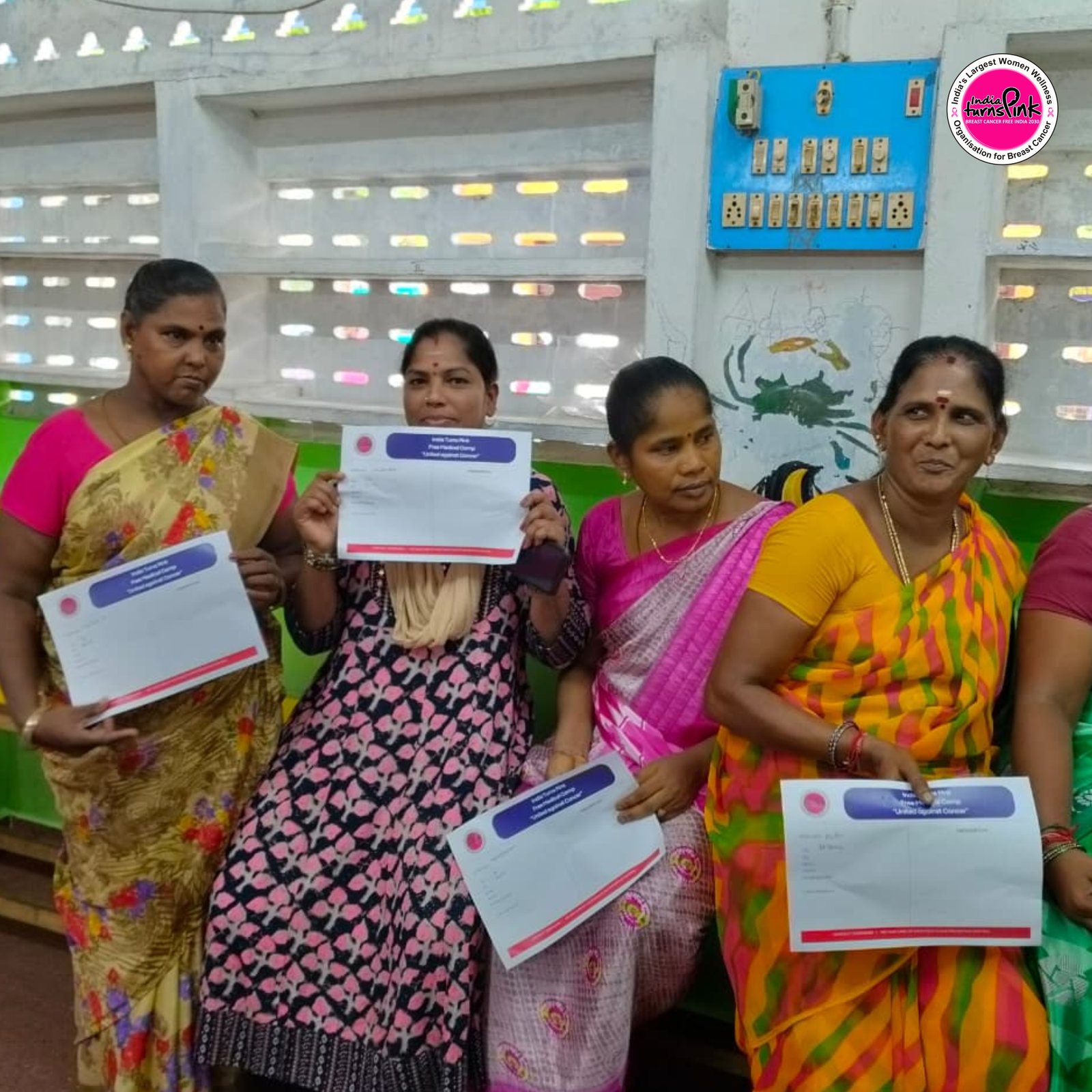 Volunteers and participants at an India Turns Pink awareness activity