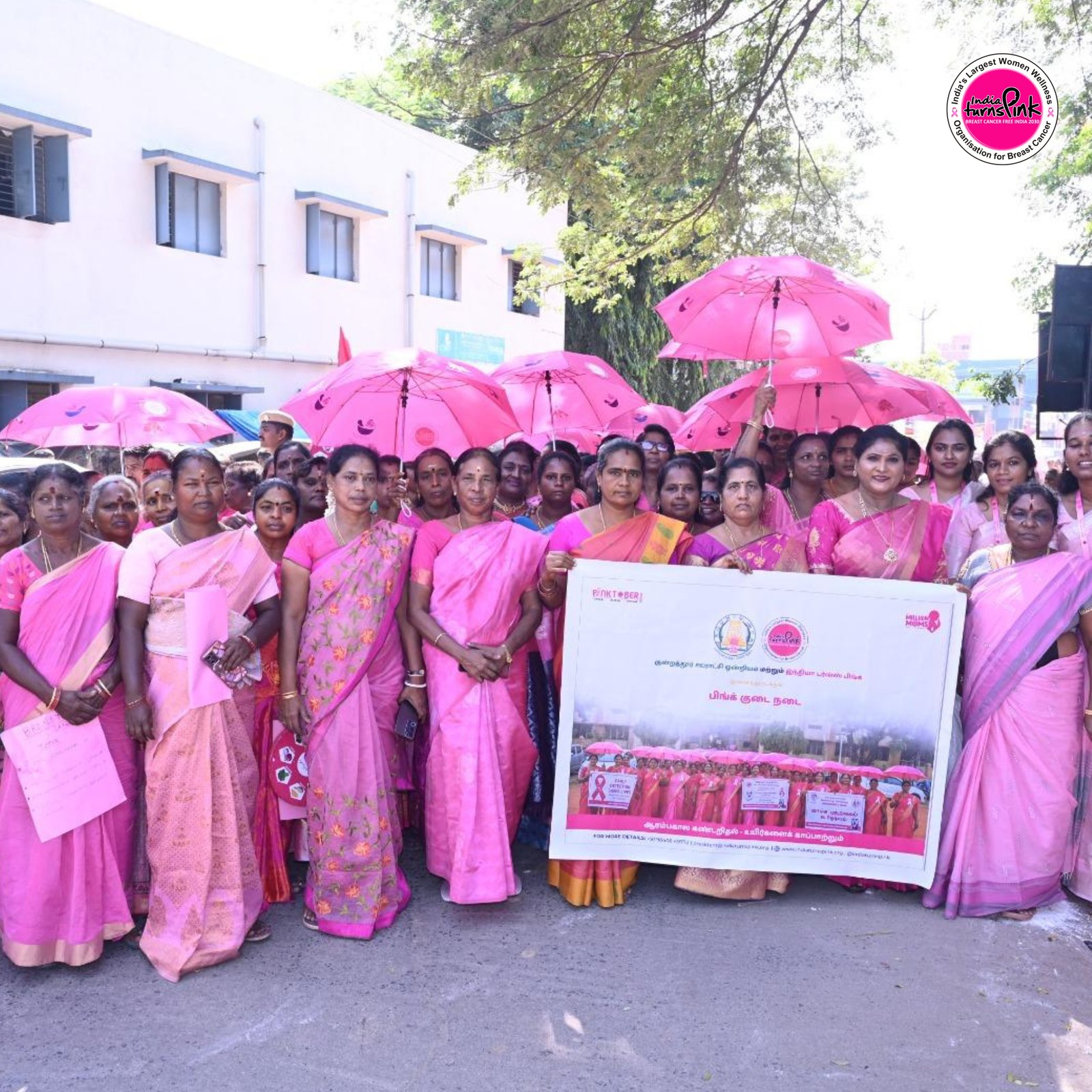 An awareness event in progress with participants dressed in pink