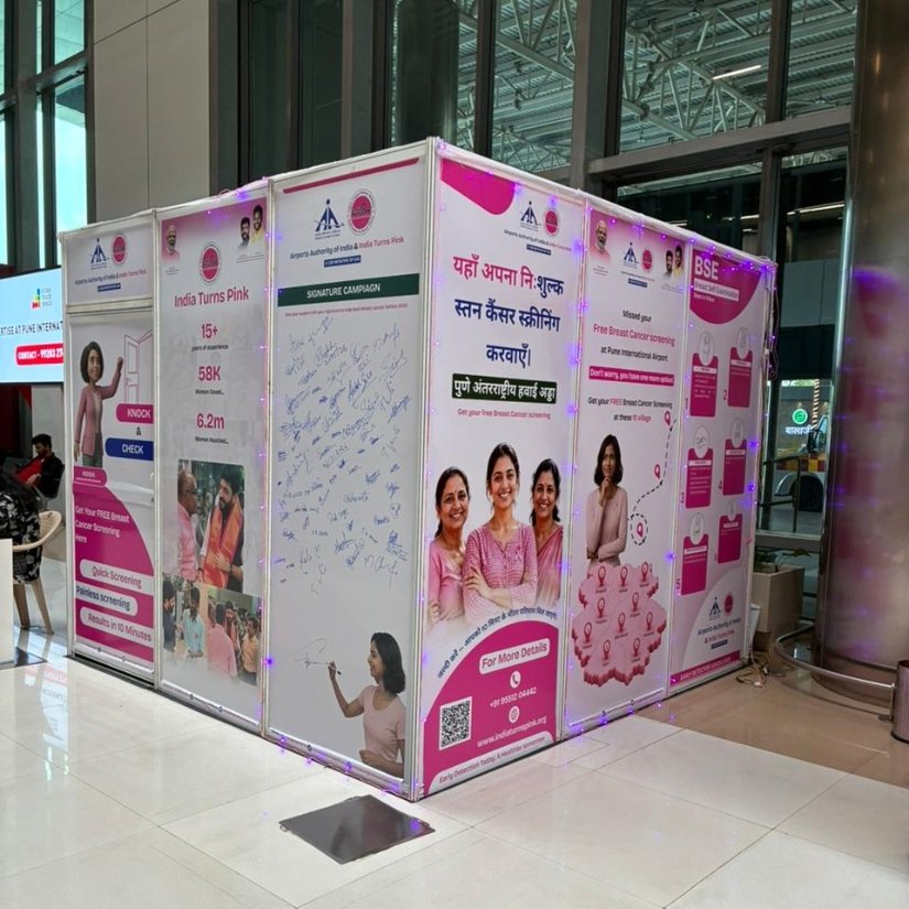 A screening and information booth set up at a public transport terminus